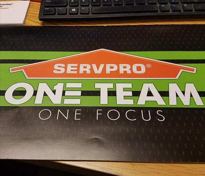 SERVPRO Logo with one team one focus