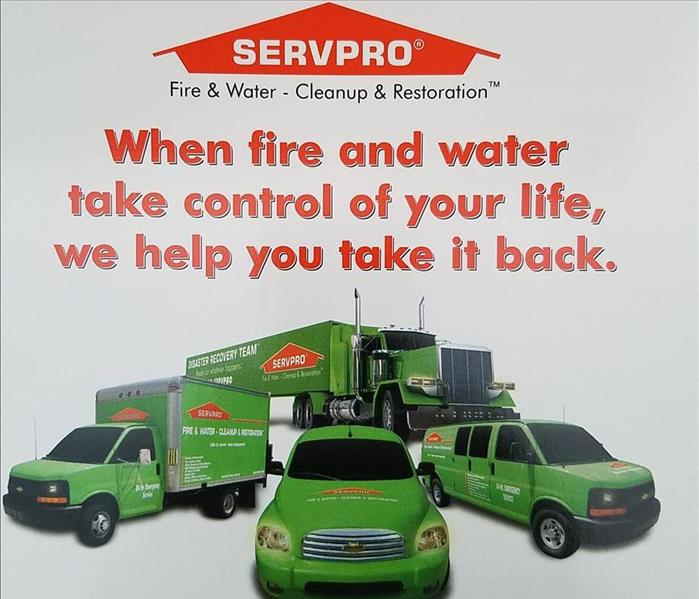 Showing SERVPRO fleet photo and text . We help you take your life back